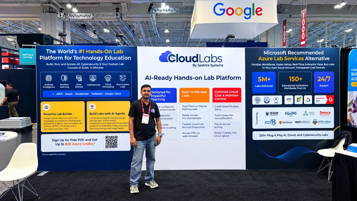 A CloudLabs team member in front of the stand's AI-ready hands-on lab platform banner
